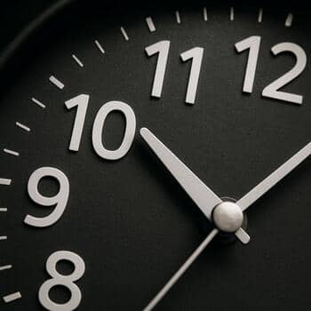 Macro photo of open sans numerals on a matte dial