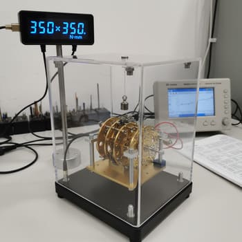 Technician measuring torque on clock movement